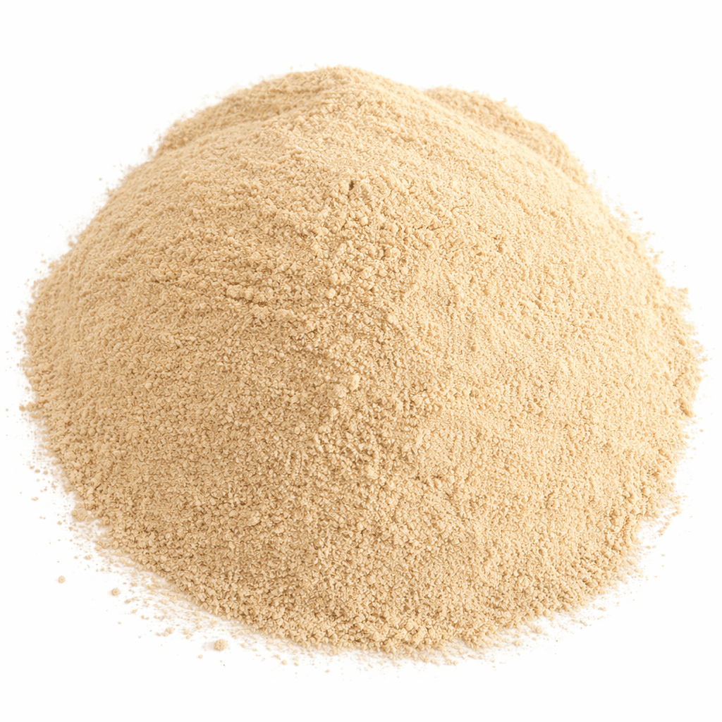 A mound of fine, light tan powder centered on a plain white background.